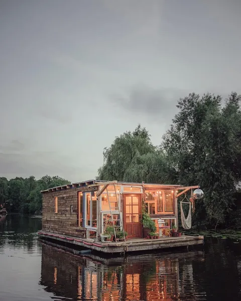This adorable floating artist's studio was handmade.