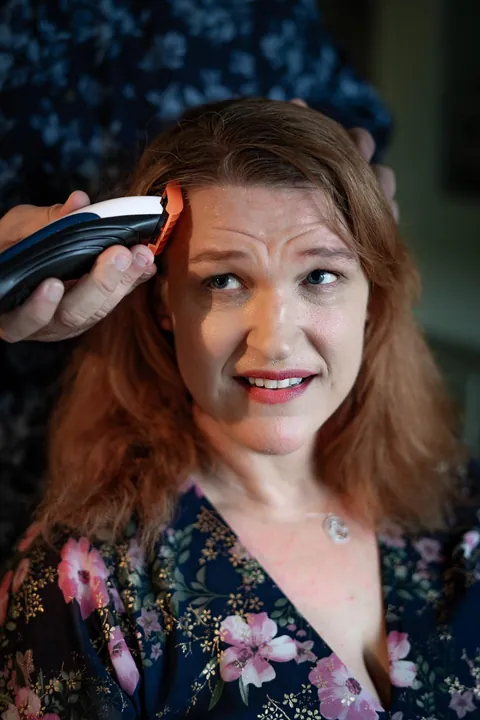 Shaving my head after week one of chemo