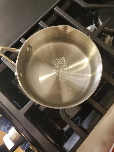 Sticker residue on my pot prevented water from boiling except for that area