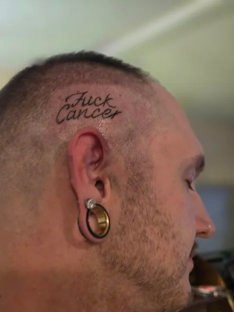 Fuck Cancer head tattoo by my dad Sean Dougherty in my living room Colfax, WA