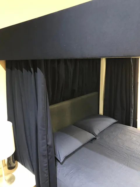 My new four-poster bed with curtains that actually close.