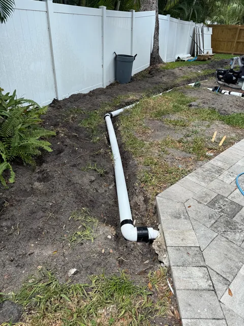 Hurricanes kept flooding my backyard so I buried 140ft of drainage pipe to prevent it.