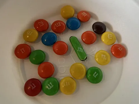 One of my M&amp;Ms is shaped like a cylinder.