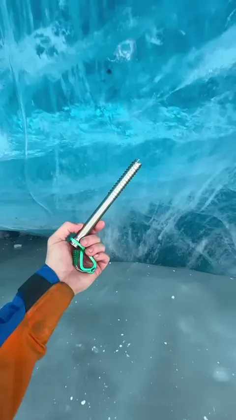 What it looks like screwing an ice screw into EXTREMELY clear ice.
