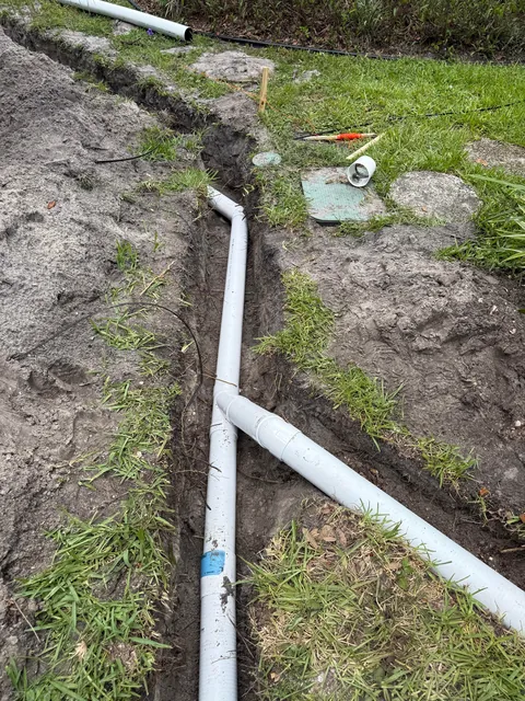 Hurricanes kept flooding my backyard so I buried 140ft of drainage pipe to prevent it.