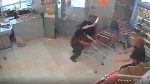 Russian Girl Attacks Store Customers With A Knife, Moscow