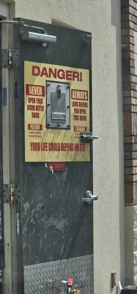 This fearful employee door at a Taco Bell.