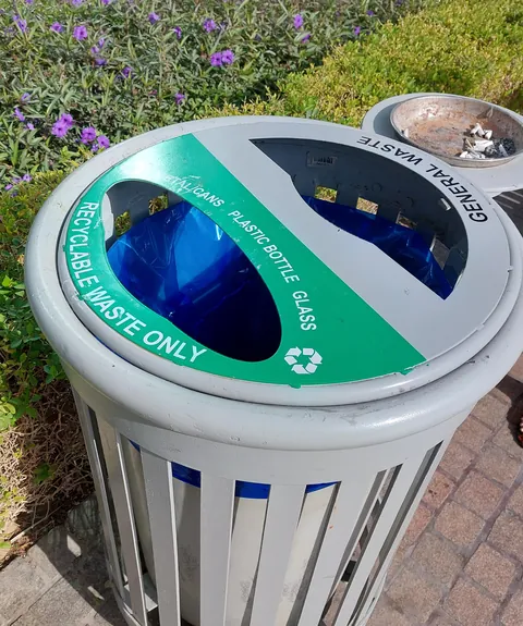 "Recycling" bins in Dubai's green city district are just one-container dumps