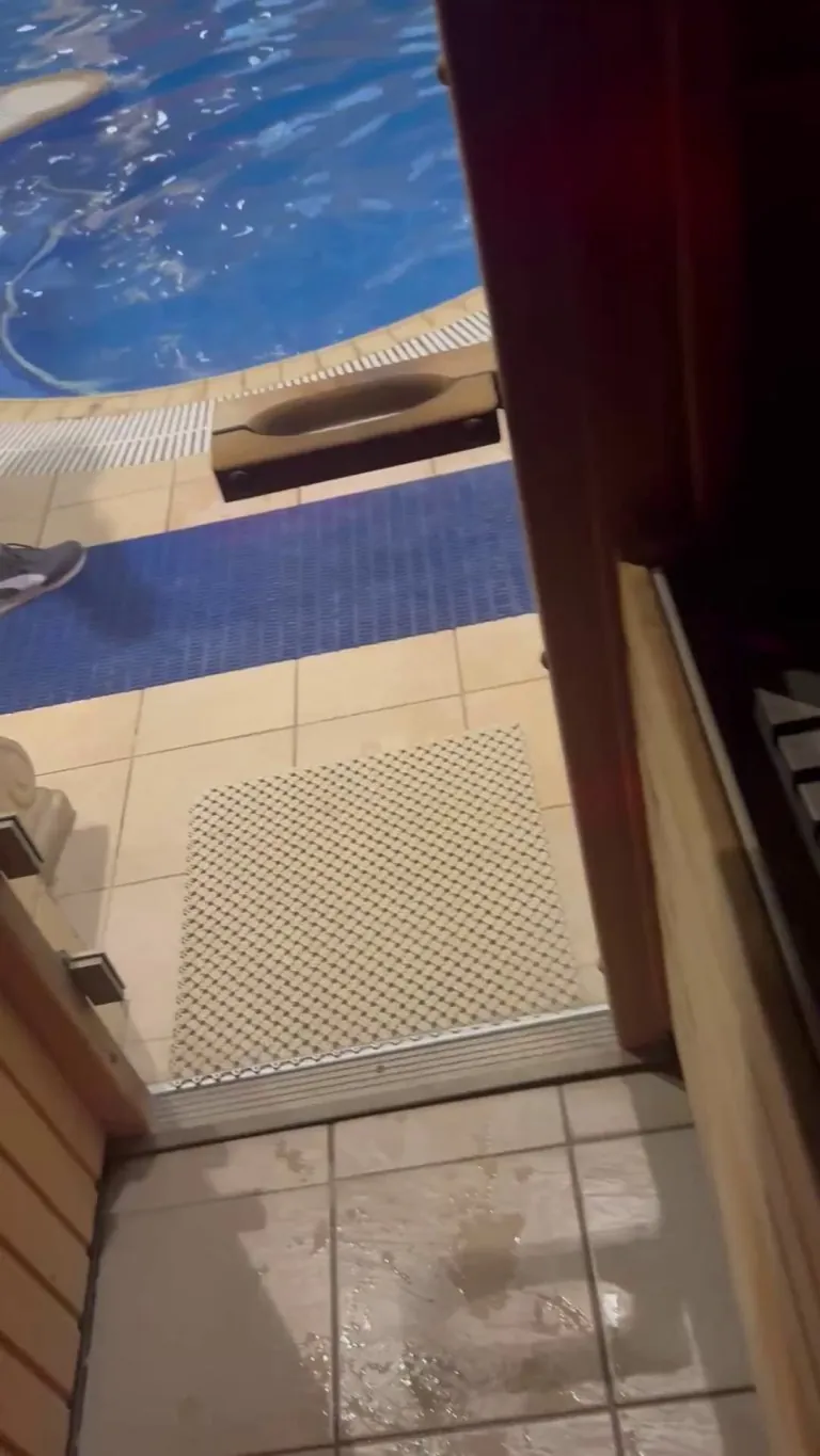 It got hot in this public sauna. No idea if the people right outside could see through the glass door