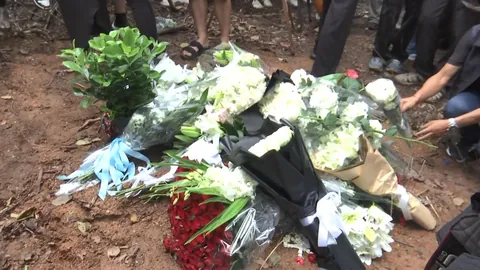 Russian Family Holds Buddhist Memorial Ceremony at Site Where Bodies Were Found