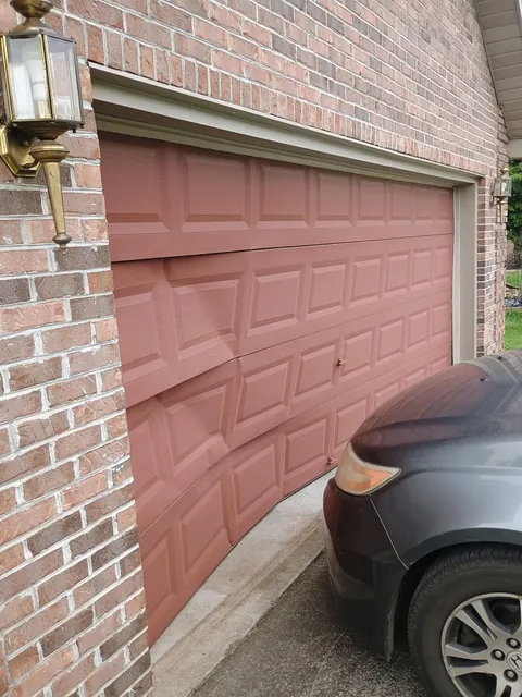 DoorCrash driver hit the garage door.