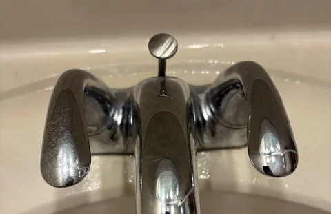 The faucet handle on the left is scratched by my wife’s wedding ring, but the handle on the right still looks almost new.