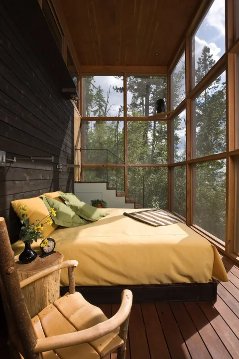 Wood bedroom in a retreat in the wilderness, Bigfork, Flathead County, Montana [2364×3546]