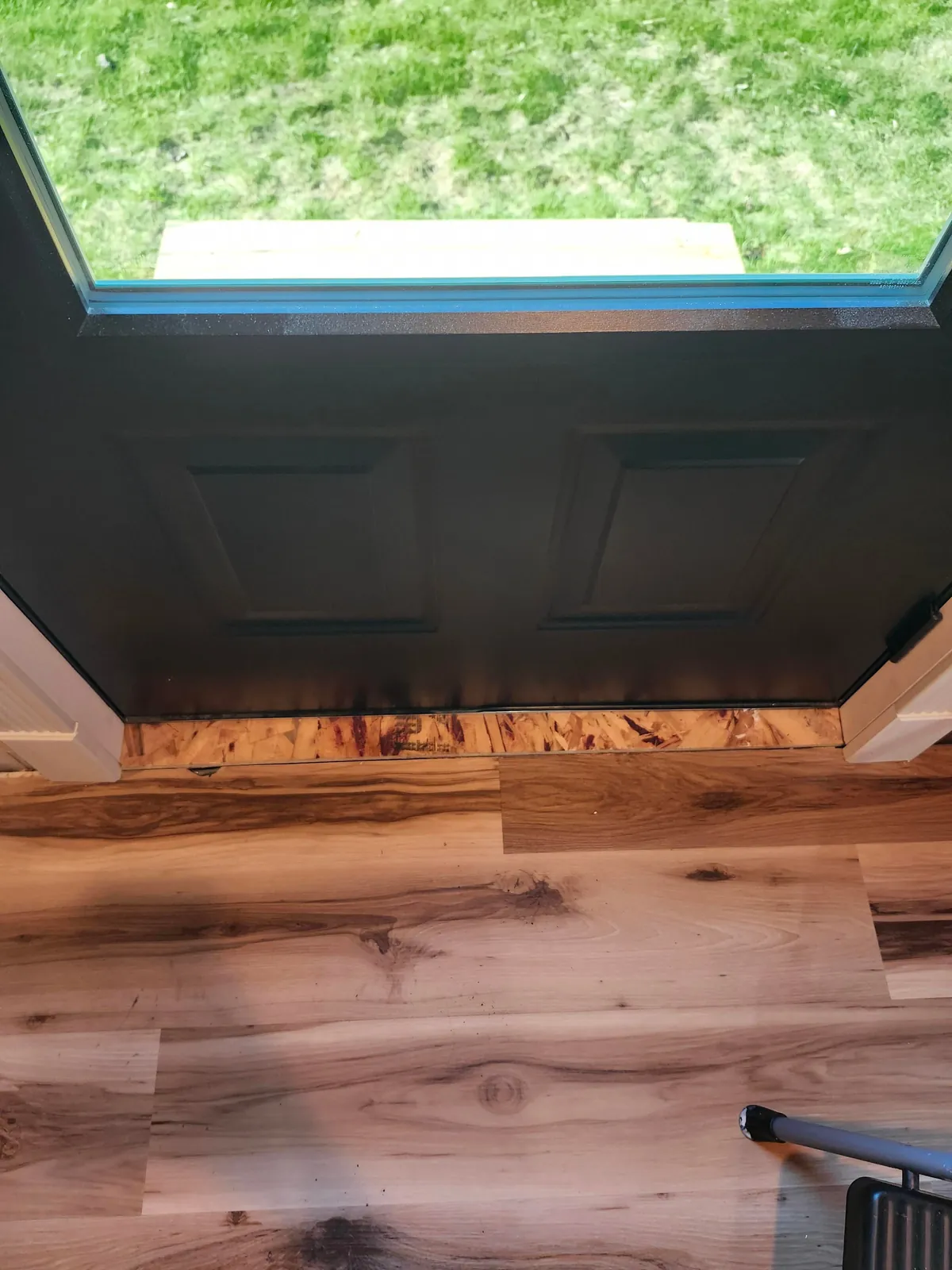 Contactors left this gap of plywood on the inside of the door. What are some ideas to cover it?