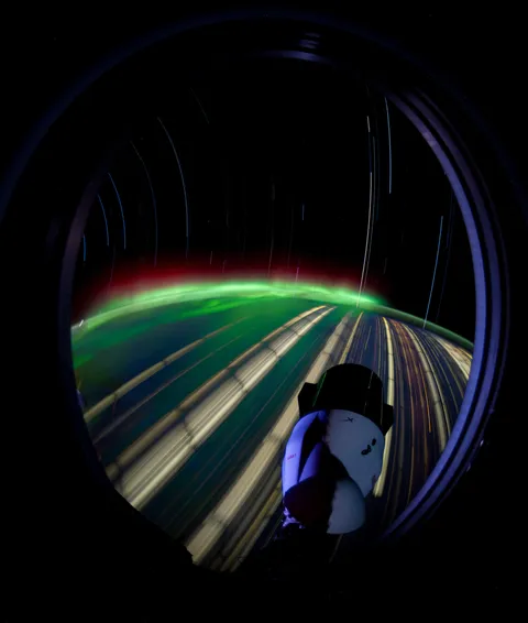 Star trail out forward looking window of Space Station. More details in comments!