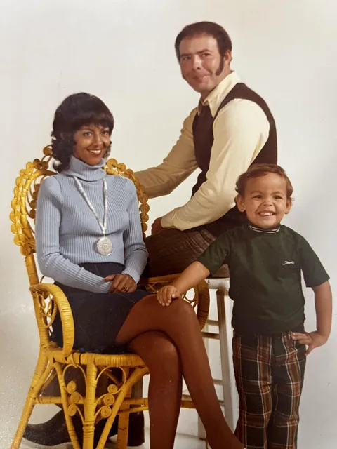A glorious family photo of my parents and me from around 1974. I wish you still had those pants in an adult size.