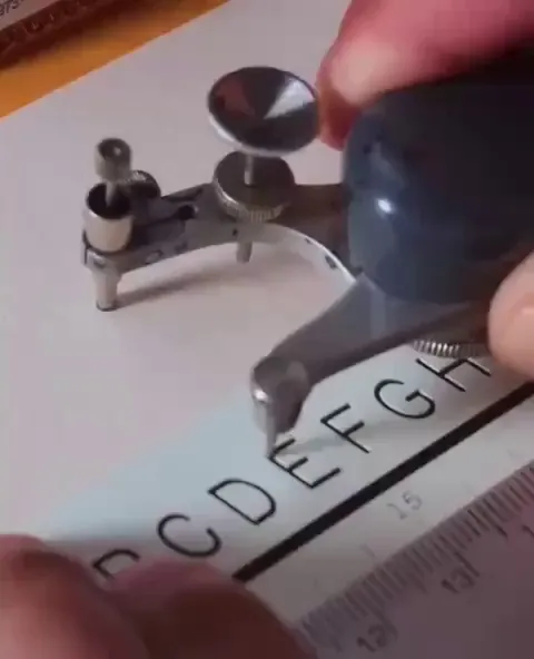 This device is called the Leroy Lettering set, and it was quite popular starting from the 1930s. Essentially, it’s a transfer tool: you trace a letter with one part of the mechanism along a stencil, while the other part reproduces the letter in ink. It was possible to adjust the thickness of the le