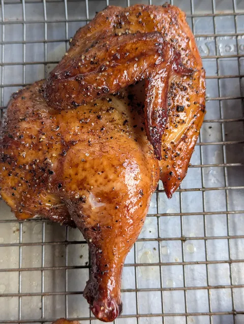 Smoked Chicken Halves with Deep Mahogany Skin