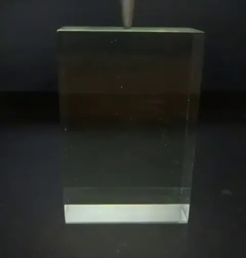 Capturing a strike of electricity using glass