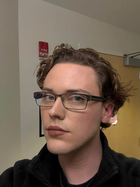 I work in a hospital on night shift, lately this has been my work look. Is it working? Do I have any blind spots? I’m looking to appear slightly to moderately androgynous without being in your face about it.