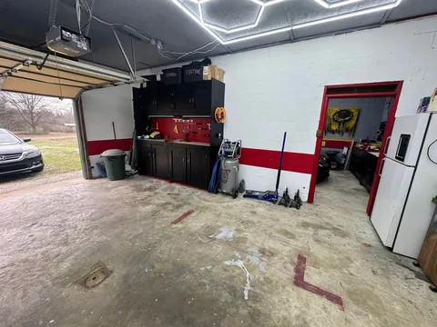Here’s an image dump of my garage over the past year. My dad painted everything on the walls. He had a blast! Hope y’all like it.