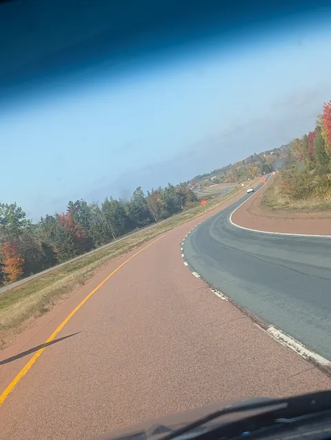 roads paved with red (ish) asphalt in Nova Scotia