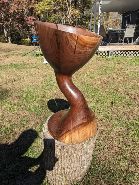 Just spent my last 3 years worth of Fall and Spring downtime carving a wooden wormhole from a single log. The concept just excites the heck out of me.
