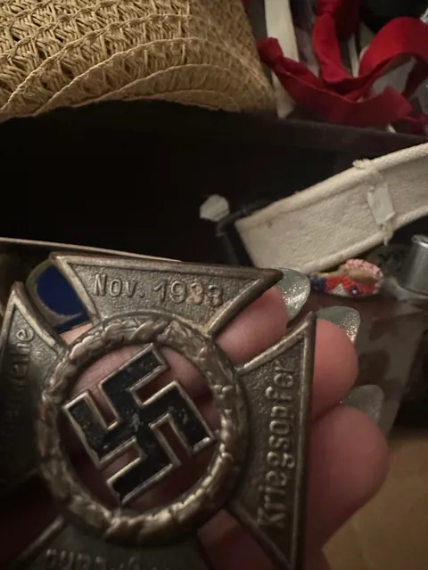 things my girlfriend great grandfather took off dead nazis bodies during WW2