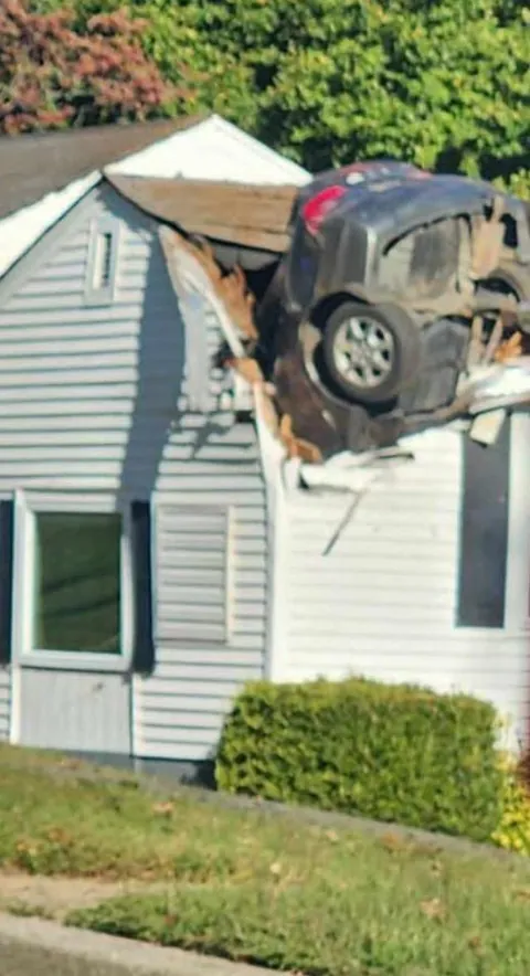 Car ended up like this after nearly 100mph down a residential street in my town (None injured)