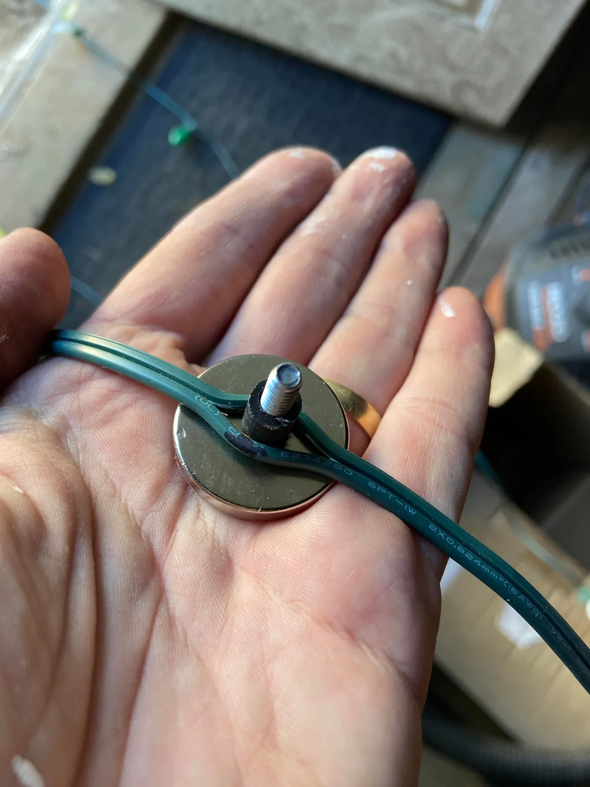 How I hang my Christmas lights with magnets and a long pole