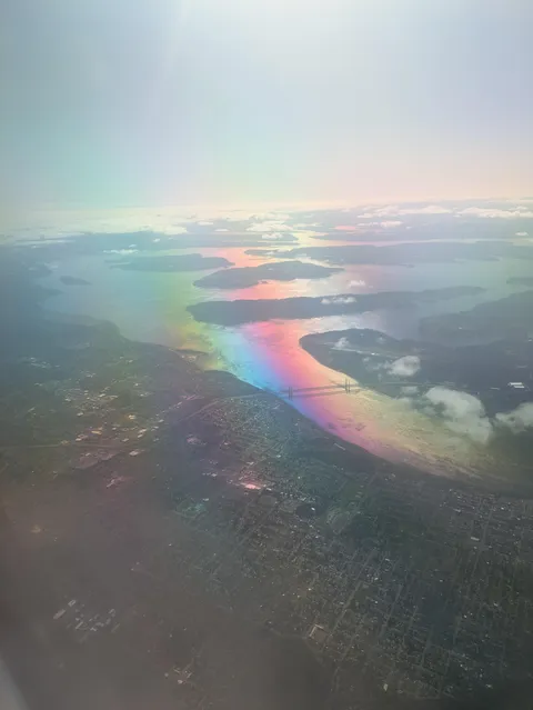 I put on my sunglasses during a flight, it turned the water rainbow