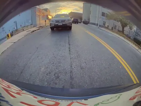 Pushy driver learns why I leave a gap at intersections (who am I kicking, they don't learn) [oc]
