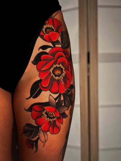 Healed Red Florals by Sarah Amelia Tattoos at Cloak and Dagger, London