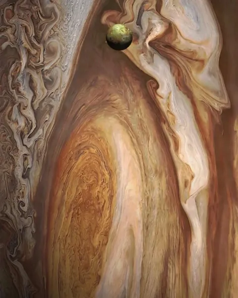 Jupiter and its fifth moon, Io.