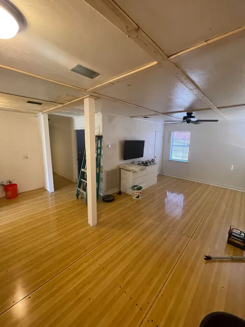 Upcycled some bowling alley lanes for flooring in my renovation project!