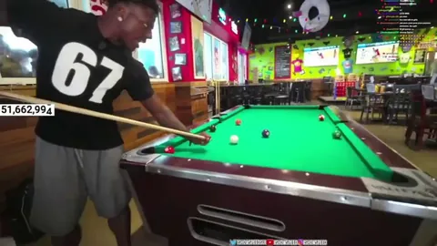 IShowSpeed makes a crazy jump shot playing 8-ball pool