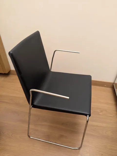 These bare metal armrests on my hotel chair. I asked, they said these are by design.