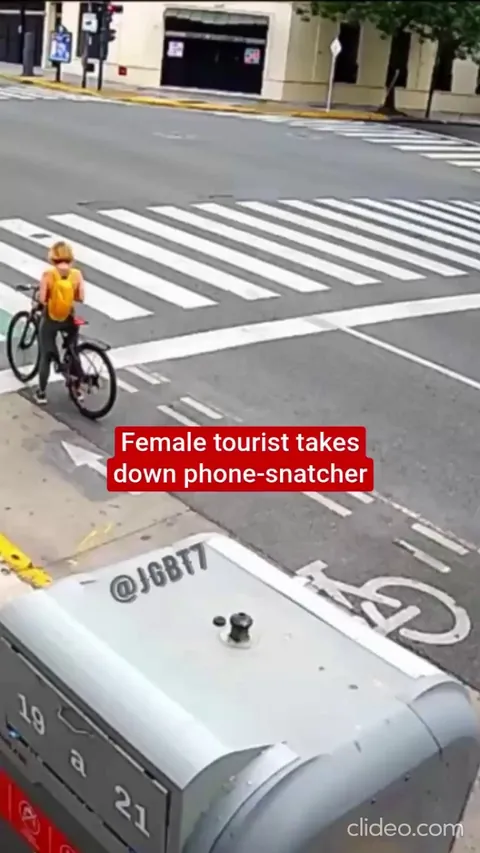 A tourist in Buenos Aires takes down a bike-riding phone thief and holds him until police arrive.