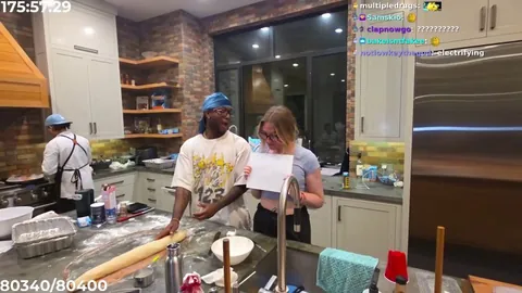 After the initial incident, QTCinderella went to Hasan's house to check the collar. She confirms the tape theory