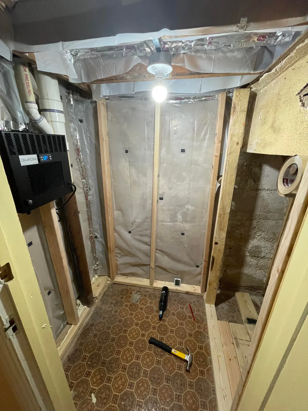 Built a wine closet under some stairs