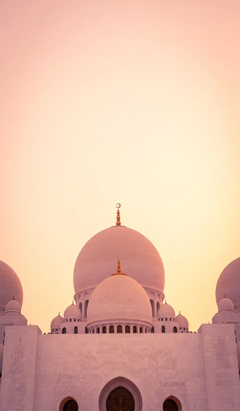 The beautiful symmetry of the Grand Mosque in Abu Dhabi.