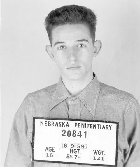 This photo shows Leslie Arnold’s mugshot. He killed his parents in Nebraska when he was just 16. He was sentenced to life in prison but escaped in 1967. Authorities were unable to locate him until 2020, when it was revealed that he had died in 2010 while living a new life in Australia. 