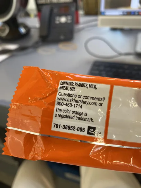 This candy wrapper indicating that the color orange is a registered trademark