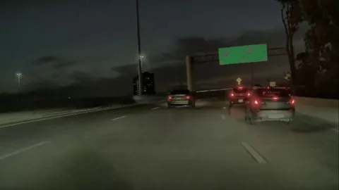 One idiot hides another, stopping in left lane to make the exit is crazy [oc]