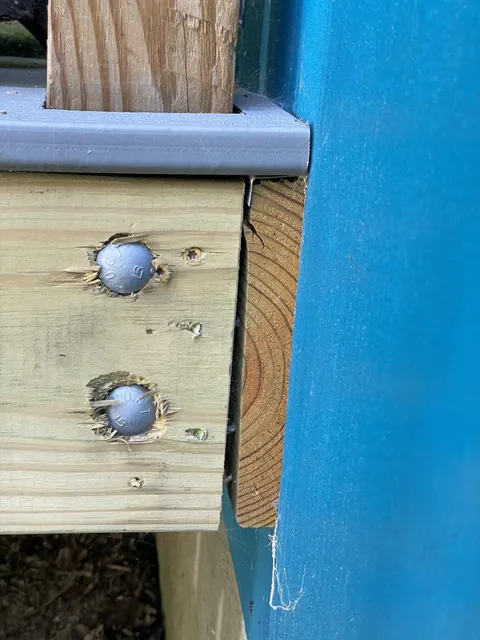 My mom’s new deck seems to be splitting away from the house. How to fix this?