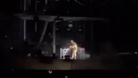 Till Lindemann, pyrotechnician and lead singer of Rammstein, dons a flamethrower backpack of his own creation