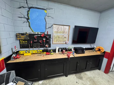 Here’s an image dump of my garage over the past year. My dad painted everything on the walls. He had a blast! Hope y’all like it.