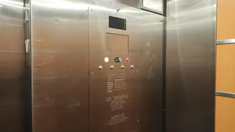 I've been stuck in an elevator for over an hour. The fire department can't get me out.