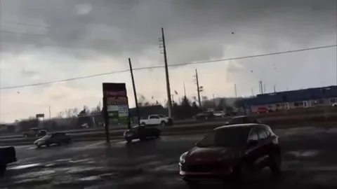 Tornado tears through Three Rivers, Michigan - captured up close as debris flies through the air. A Menards store collapsed, no word yet on casualties.