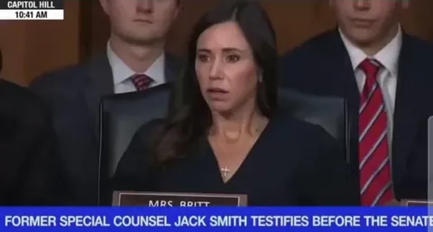 Alabama Senator Katie Britt watches colleague, Eric Schmitt, make an ass of himself